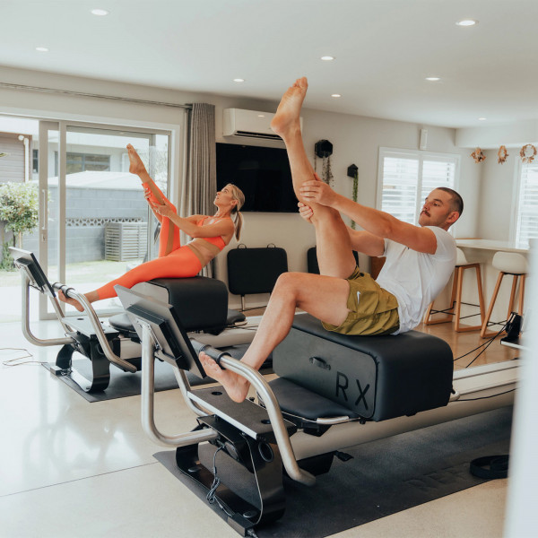 Seated leg extension exercise on the NordicTrack Ultra 1 Reform RX-S