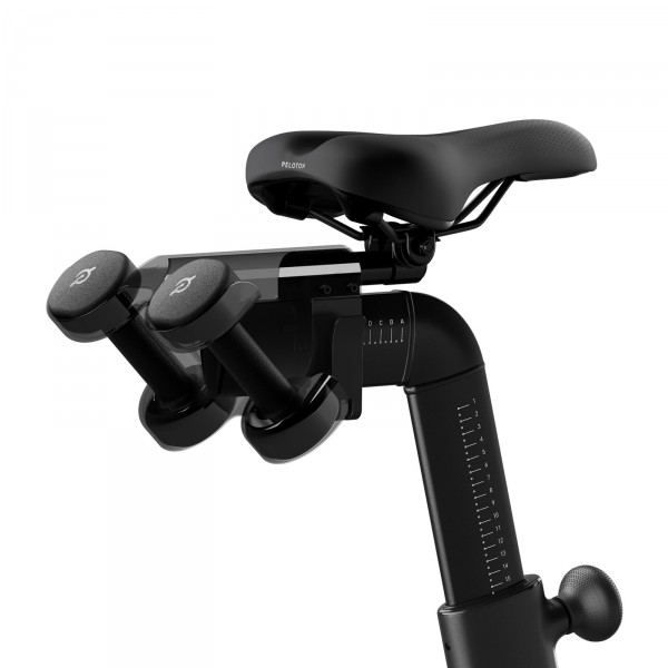 Peloton Bike - two small dumbbell holders included