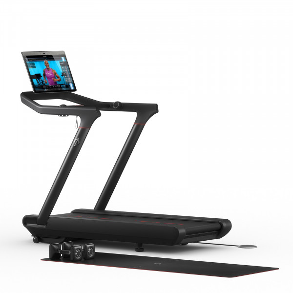 Back-left view of the Peloton Original Series Tread with accessories