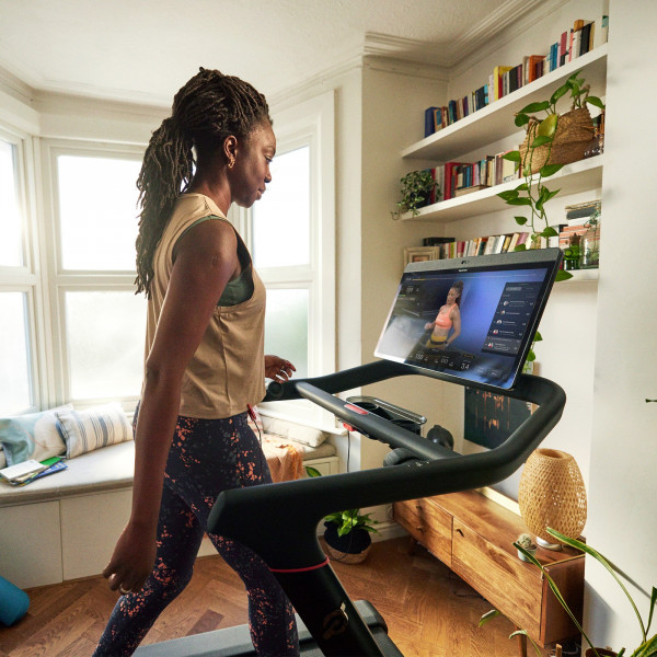Person warming up on the Peloton Original Series Tread before a workout