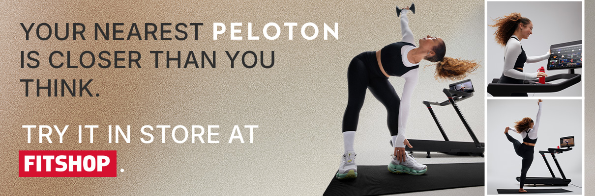 Person stretching beside the Peloton Cross Training Tread with Fitshop in-store trial promotion