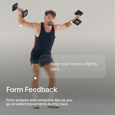 Model receiving form feedback while exercising with the Peloton Tread Vision