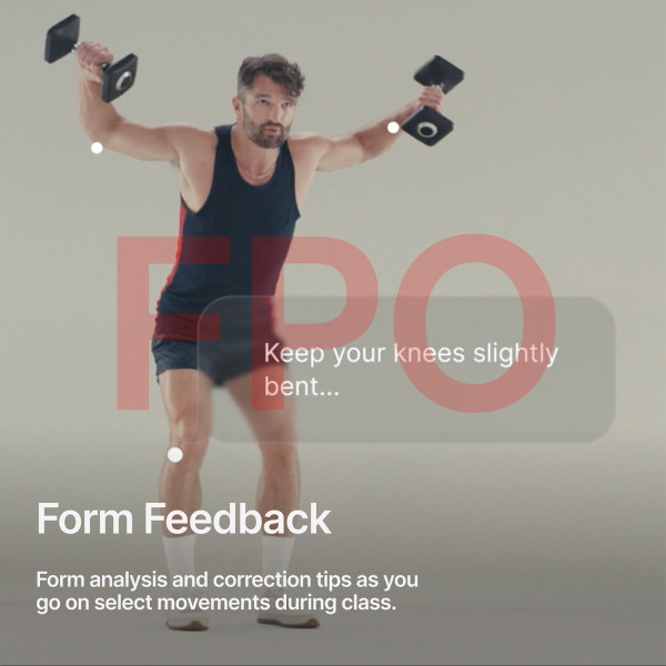 Model receiving form feedback while exercising with the Peloton Tread Vision