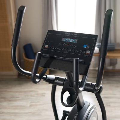 Close-up of the ProForm Carbon EL Elliptical handlebars and console in home setting 