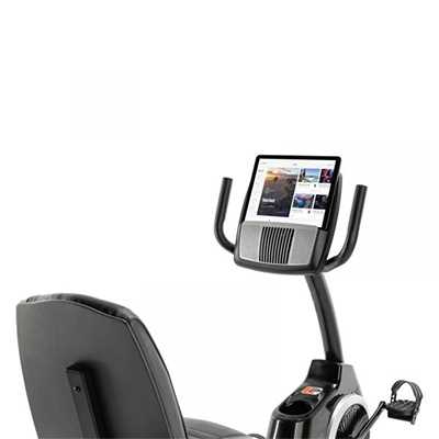 Front close-up view of the ProForm 325 CSX Recumbent Bike tablet shelf with tablet display 