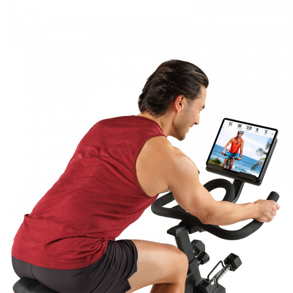 Model cycling on the ProForm Pro Trainer 500 Bike following an iFIT workout
