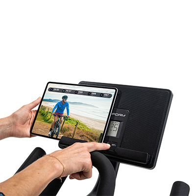 Close-up of tablet displaying iFIT workout on the ProForm Sport CX Bike