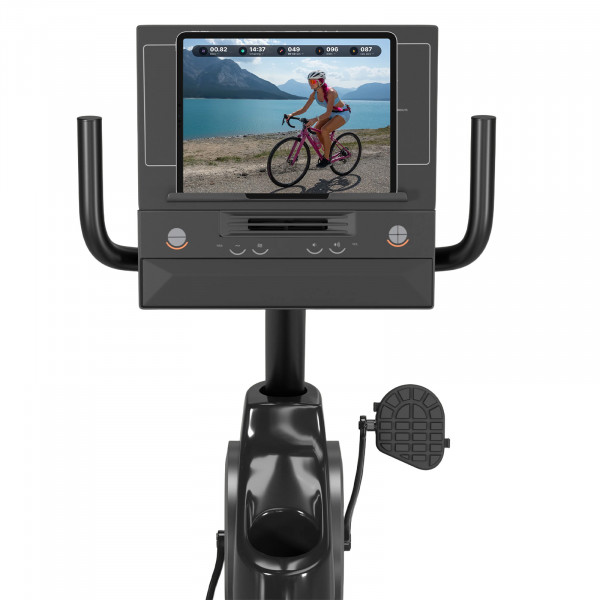 Front view of the ProForm 325 CSX Recumbent Bike console with a workout displayed on a tablet