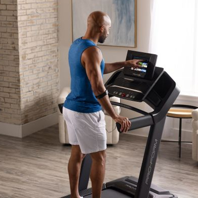 image of a model using the ProForm Carbon Pro 2000 Treadmill touchscreen