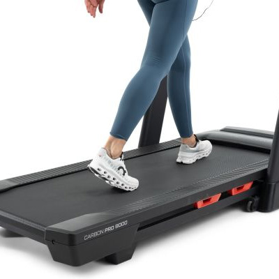 product image of a model walking on the ProForm Carbon Pro 9000