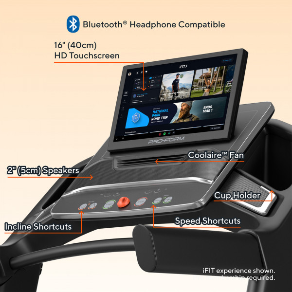Closeup of the touchscreen, speakers, fan, cup holders, and shortcut controls on the ProForm Carbon Pro 9000 Treadmill
