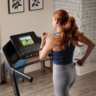 image of a model running on the ProForm Carbon TL Treadmill