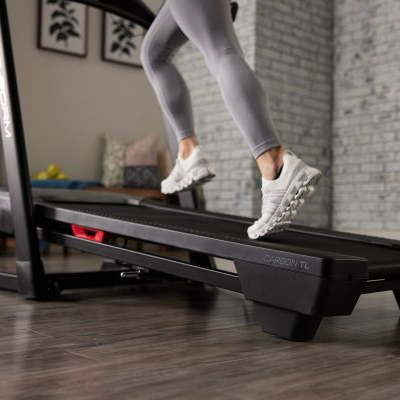 image of a model running on the ProForm Carbon TL Treadmill whilst on an incline