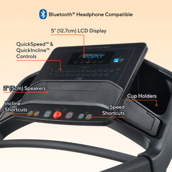 Console close-up showing controls, speakers, and display features