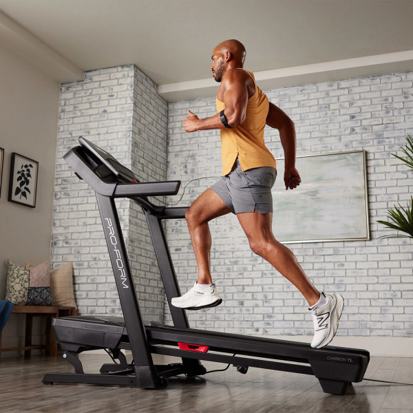 Model running on the ProForm Carbon TL Treadmill