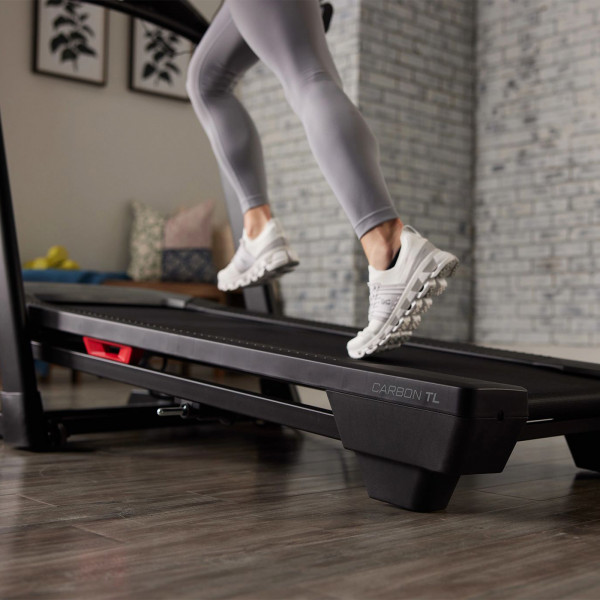 Close-up of running shoes on the ProForm Carbon TL Treadmill deck