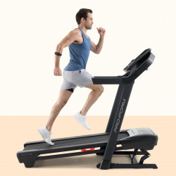 Side view of a model running on the ProForm Carbon TLS Treadmill
