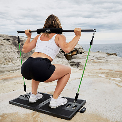 User doing squat outdoors