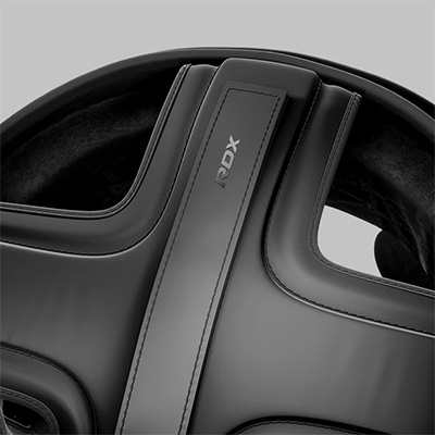 A close up of the RDX Noir Head Guard strap.