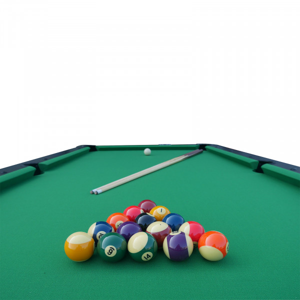 Close-up view of the Roberto Sport First 7ft Pool Table with green cloth, showing numbered balls, a white ball, and a cue on the playing surface.