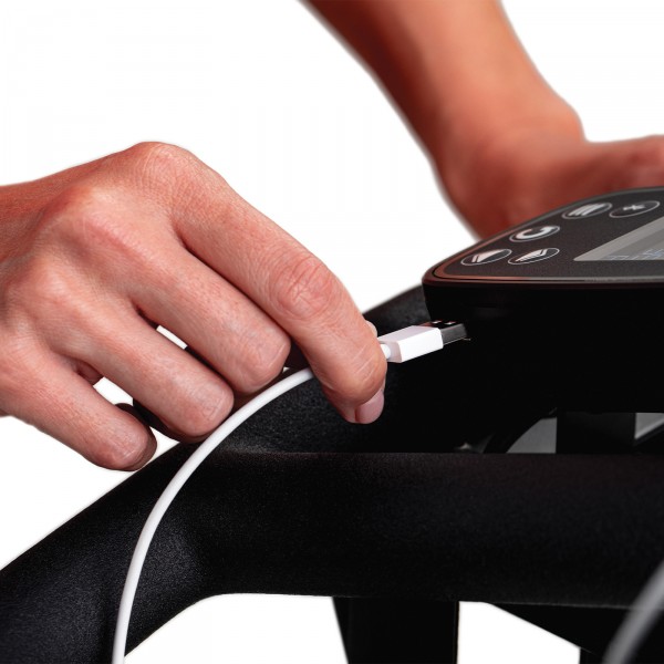 Close-up of the USB charging port on the Schwinn 800IC Indoor Cycling Bike, facilitating device charging during workouts
