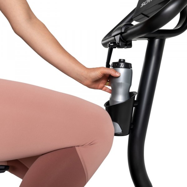 Close-up of a bottle holder attached to the frame of the Schwinn 590U Upright Bike