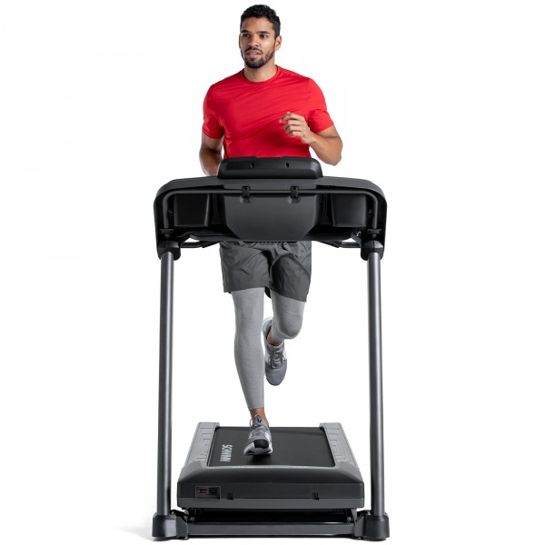 A user jogging on the Schwinn 510T Treadmill.