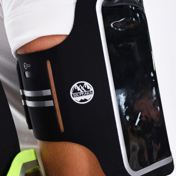 Close-up view of the Six Peaks Armband Phone Holder on arm in black colour