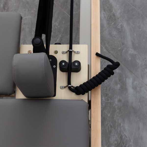 Close-up of pulley system and strap attachment on the Skelcore Classic Reformer - American Maple