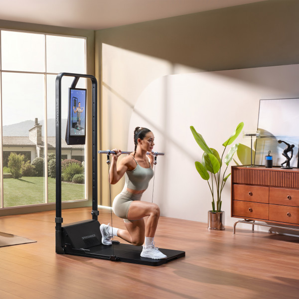 Person performing a lunge exercise on the Speediance Gym Monster 2 - Works Plus