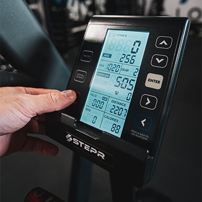A close-up lifestyle image of the STEPR Bionic Bike XL console