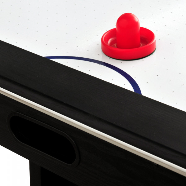 Close-up of the puck on the Sure Shot Competition Air Hockey Table.
