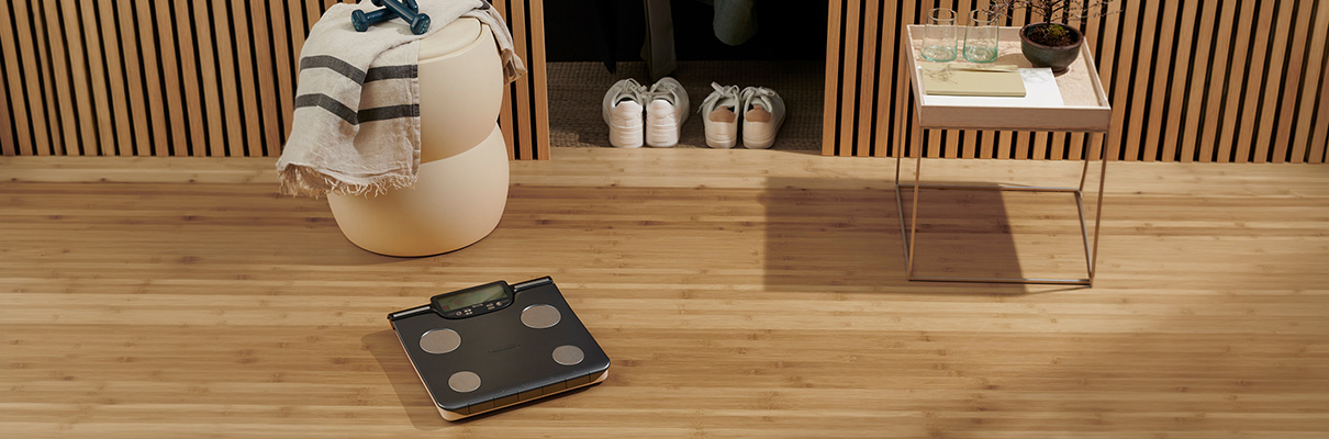 Banner showing the TANITA BC-613 Segmental Body Composition Scale in a room setup