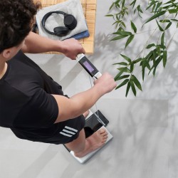 TANITA RD-545HR Smart Segmental Body Composition Scale - man using a scale