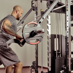 Person mid-workout using the Taurus MS50 Pro Multi Smith.
