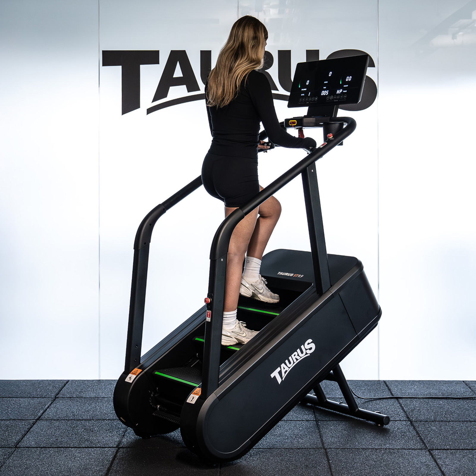 A lifestyle image of a model using the Taurus ST9.9 Stair Trainer