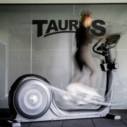 Taurus X9.9_Light_Commercial_Rear_Wheel_Elliptical_Crosstrainer5_in_use_1600_1600