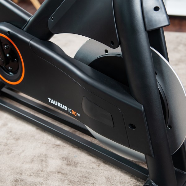 Close-up view of the flywheel on the Taurus IC90 Pro Exercise Bike.
