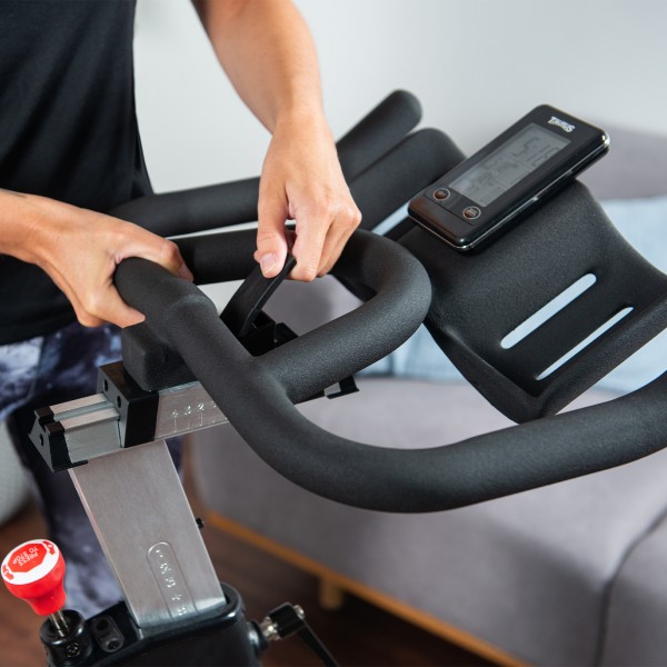 View of the handlebar adjustment options on the Taurus IC90 Pro Exercise Bike.
