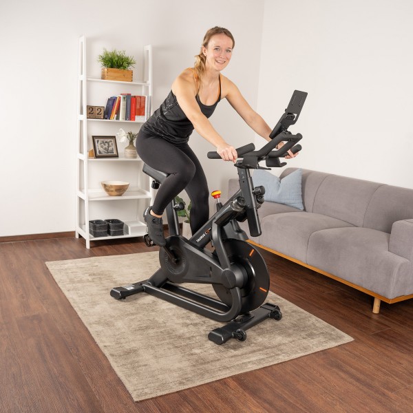 Taurus IC70 Smart Indoor Bike - in action during an intense workout session
