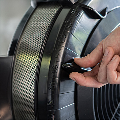 Close up of the Taurus Elite Row resistance dial being adjusted