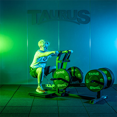 Model squatting on the Taurus Pro Iso Belt Squat (front angle)