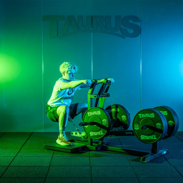 Model squatting on the Taurus Pro Iso Belt Squat (front angle)