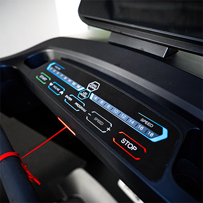 Close-up of the Taurus T10.5 Pro Treadmill quick speed controls and safety key  