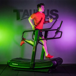 User in a high-intensity session on the Taurus Elite Run Curved Treadmill.
