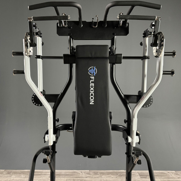 Studio image of the Taurus Flexicon Bench folded into the Taurus Flexicon Resistance Trainer