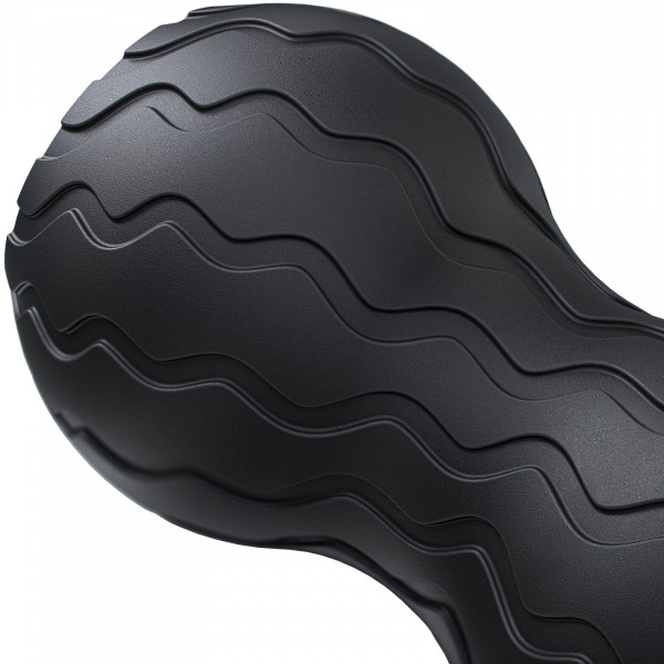 Close-up of the wave-textured design of the Theragun Wave Duo.