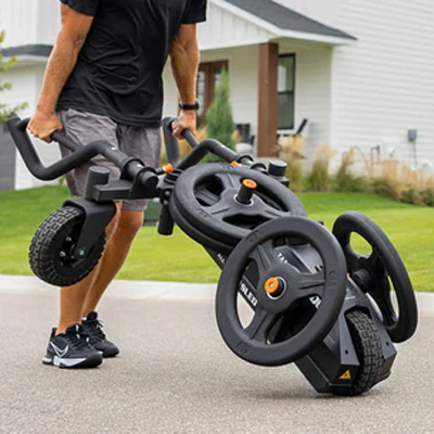 Image of a model using the Torque TANK M1S in its wheelbarrow mode.