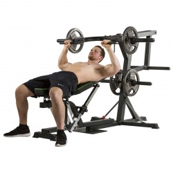 User performing a chest press on the Tunturi WT80 Multi Gym.
