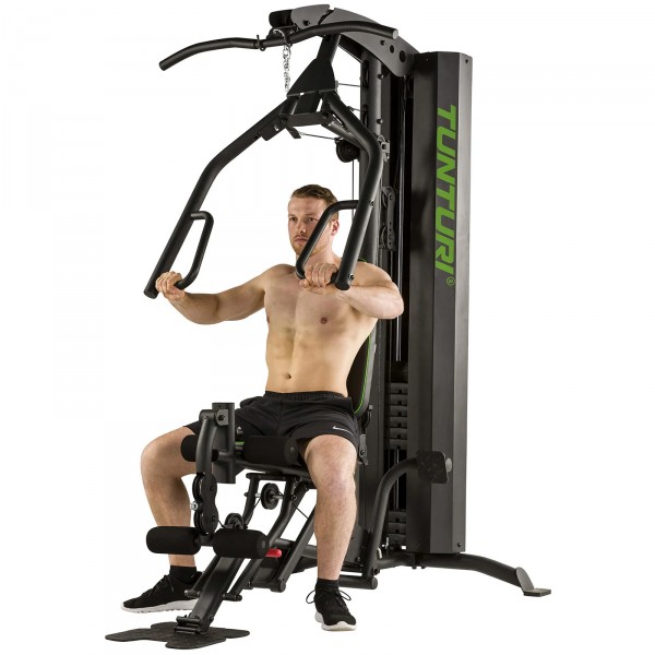 User performing a chest press on the Tunturi HG60 Multi Gym.